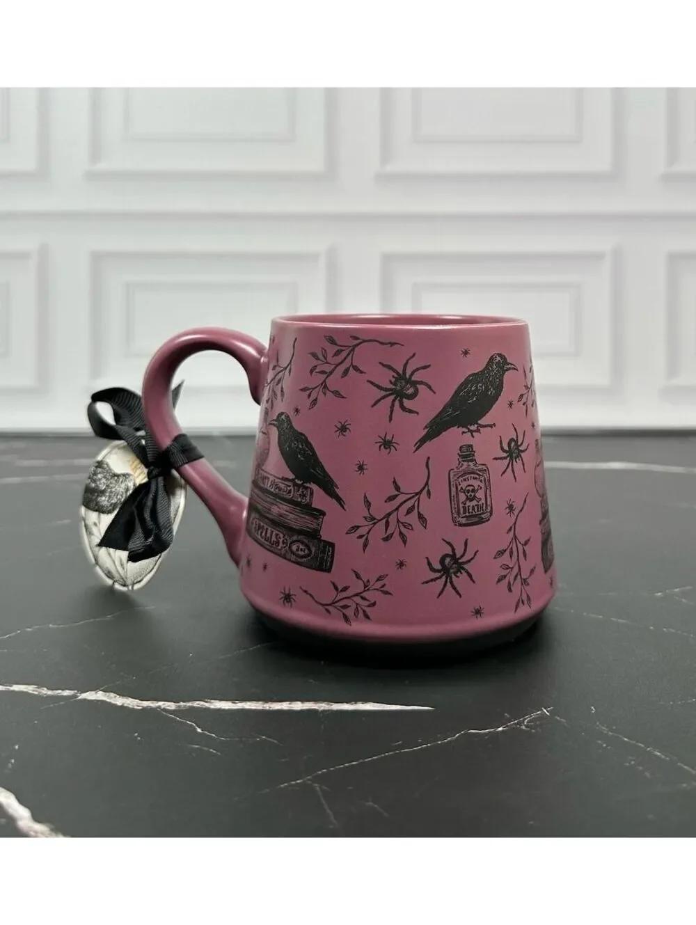 Connecting on Paper 2021 co. Crafted Ceramic Mug with Raven and Spellbook Design